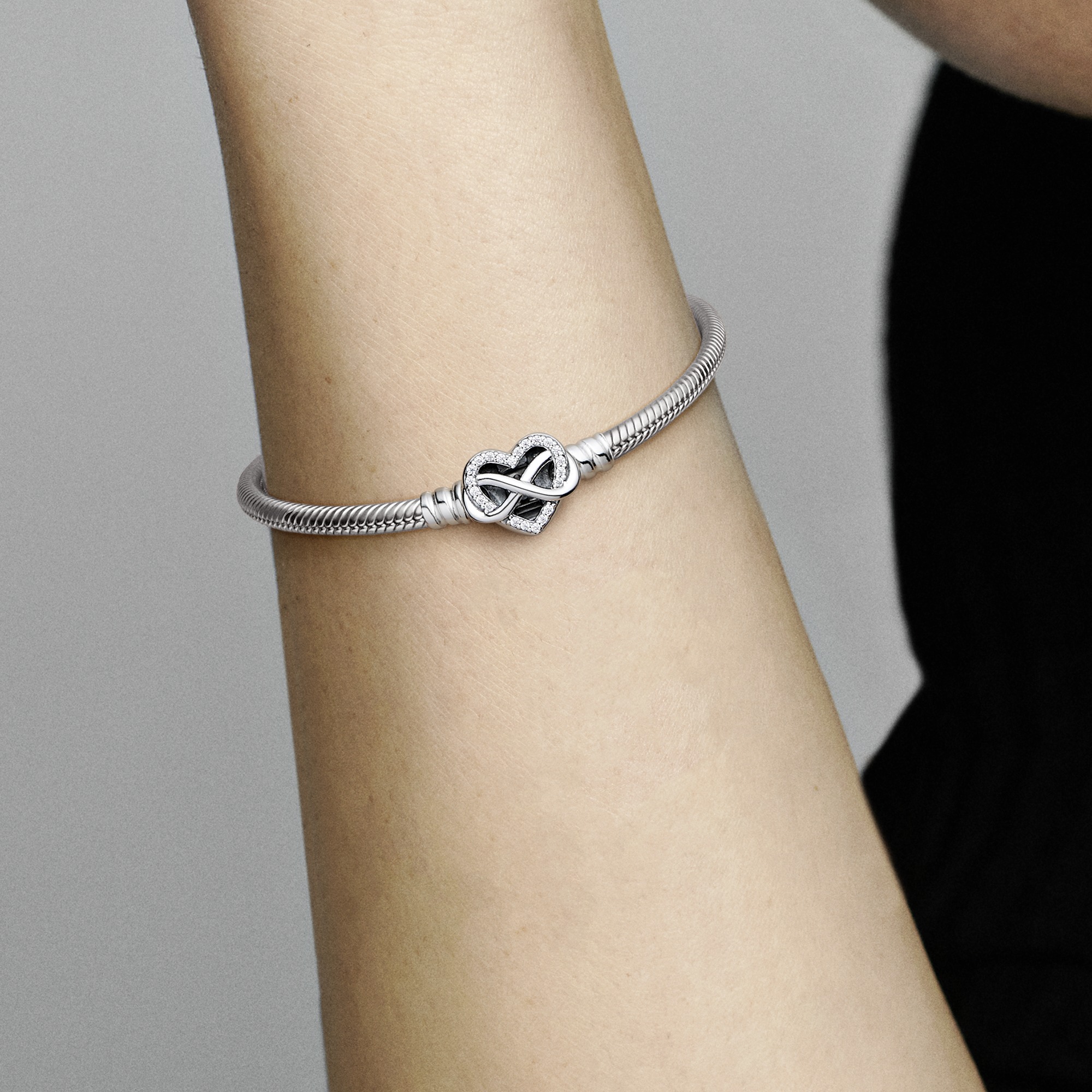 Snake chain sterling silver bracelet with infinity