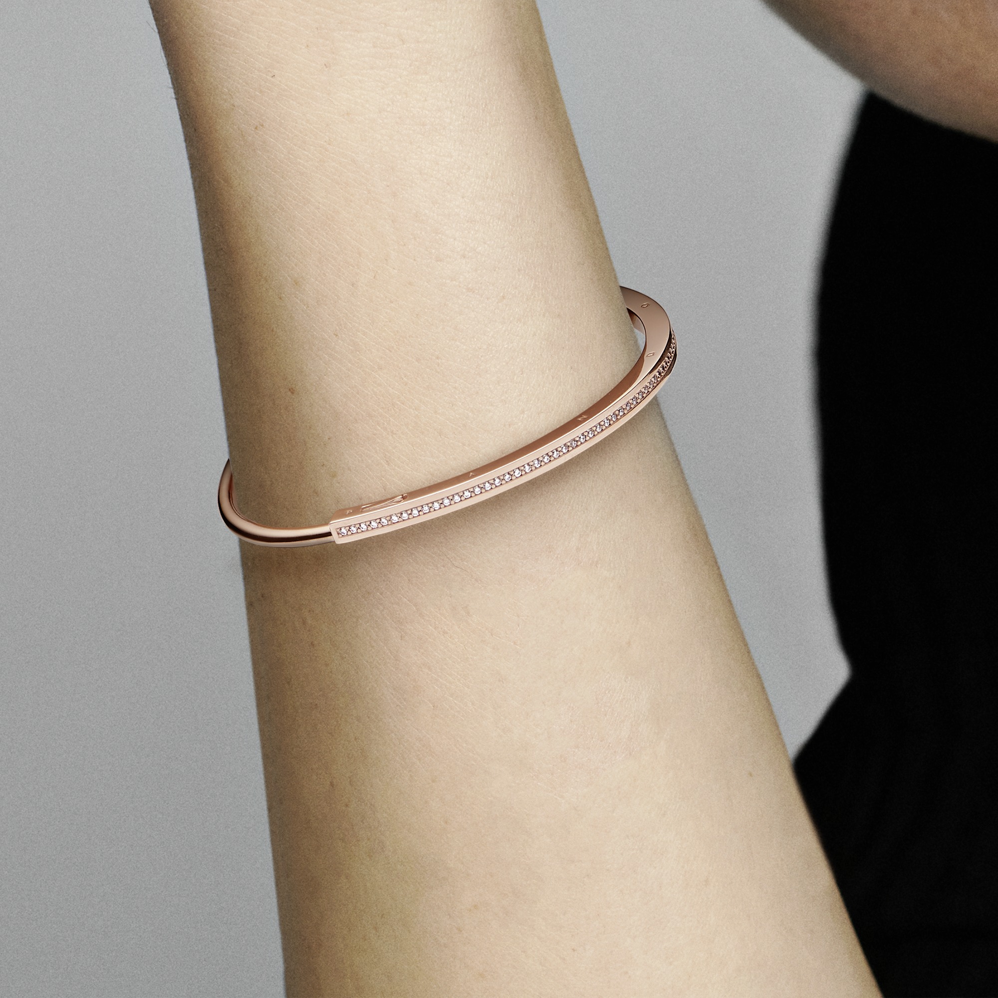 Pandora logo 14k rose gold-plated bangle with clear cubic zirconia