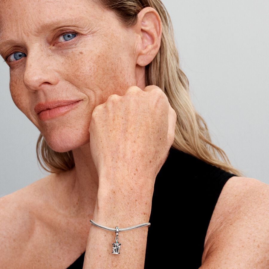 Moveable carousel sterling silver dangle with glit