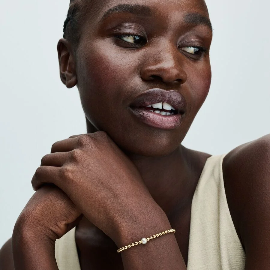 Beaded 14k gold-plated bracelet with white treated freshwater cultured pearl and clear cubic zirconi