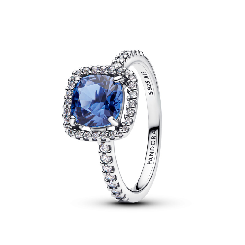 Sterling silver ring with cornflower blue crystal and clear cubic zirconia
