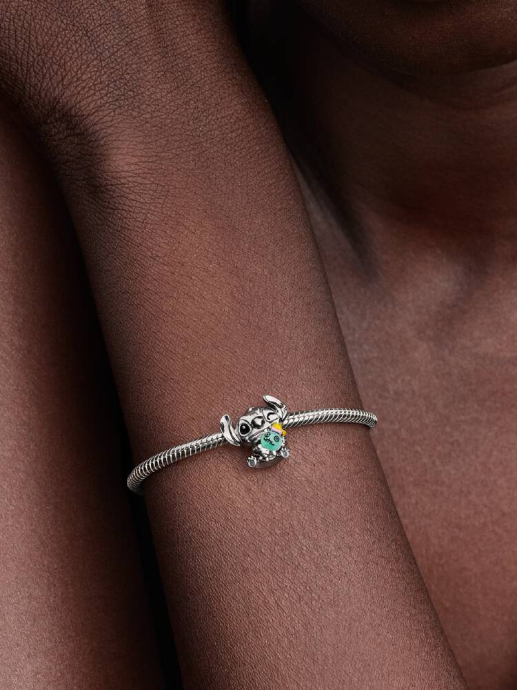 Disney Stitch sterling silver charm with green Mur