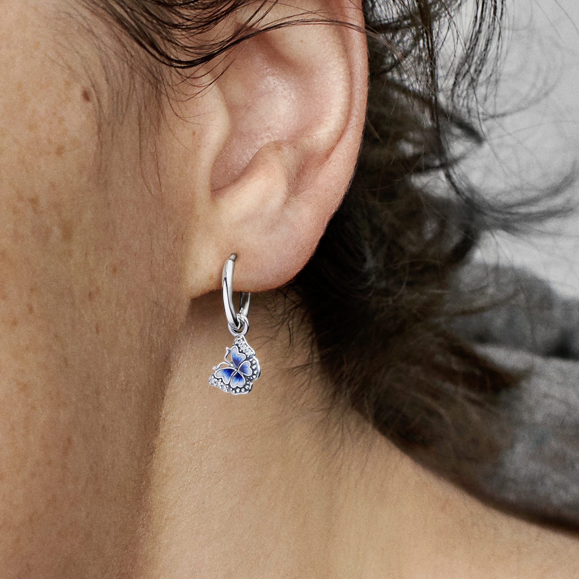 Butterfly sterling silver hoop earrings with clear
