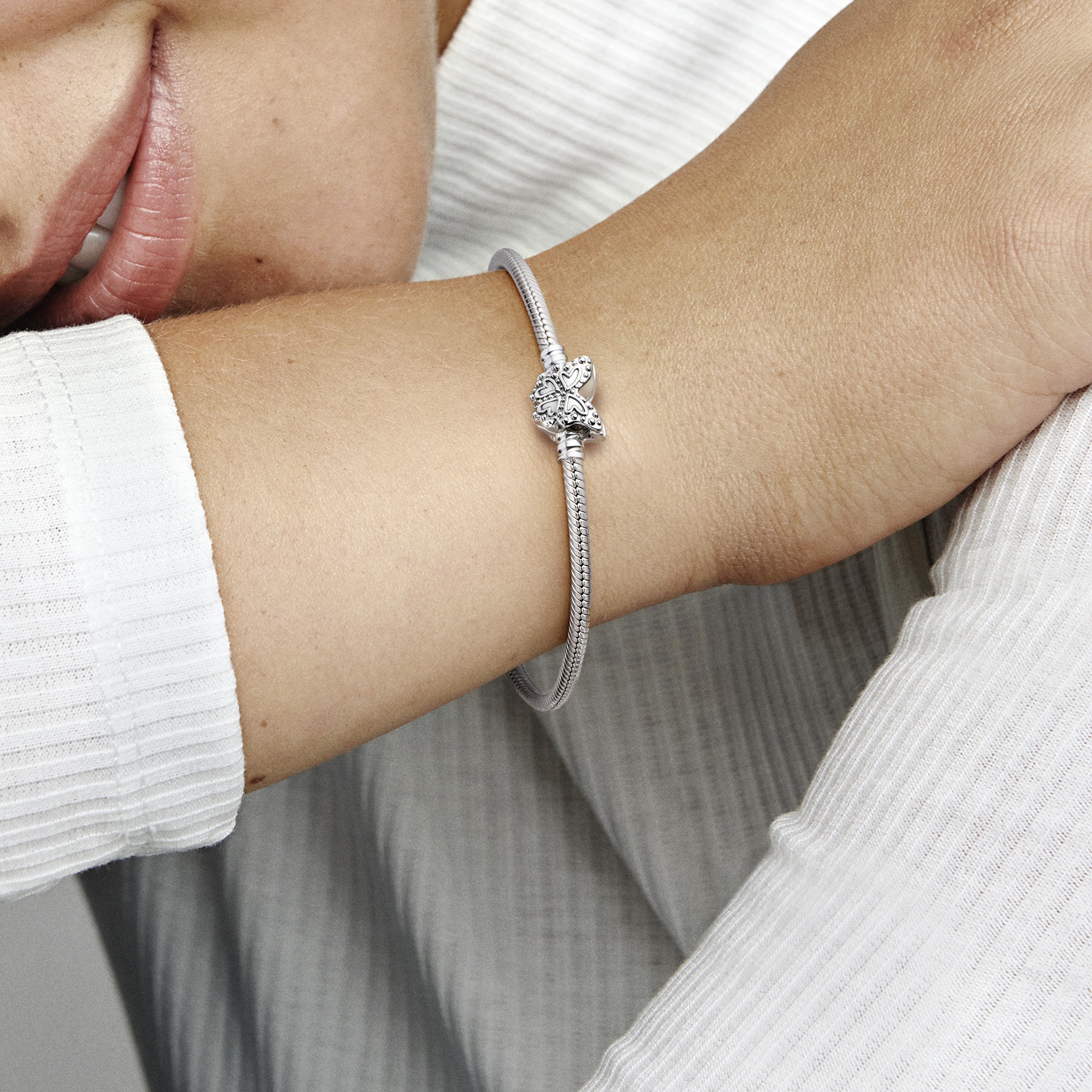 Snake chain sterling  silver bracelet with butterfly clasp with  clear cubic zirconia