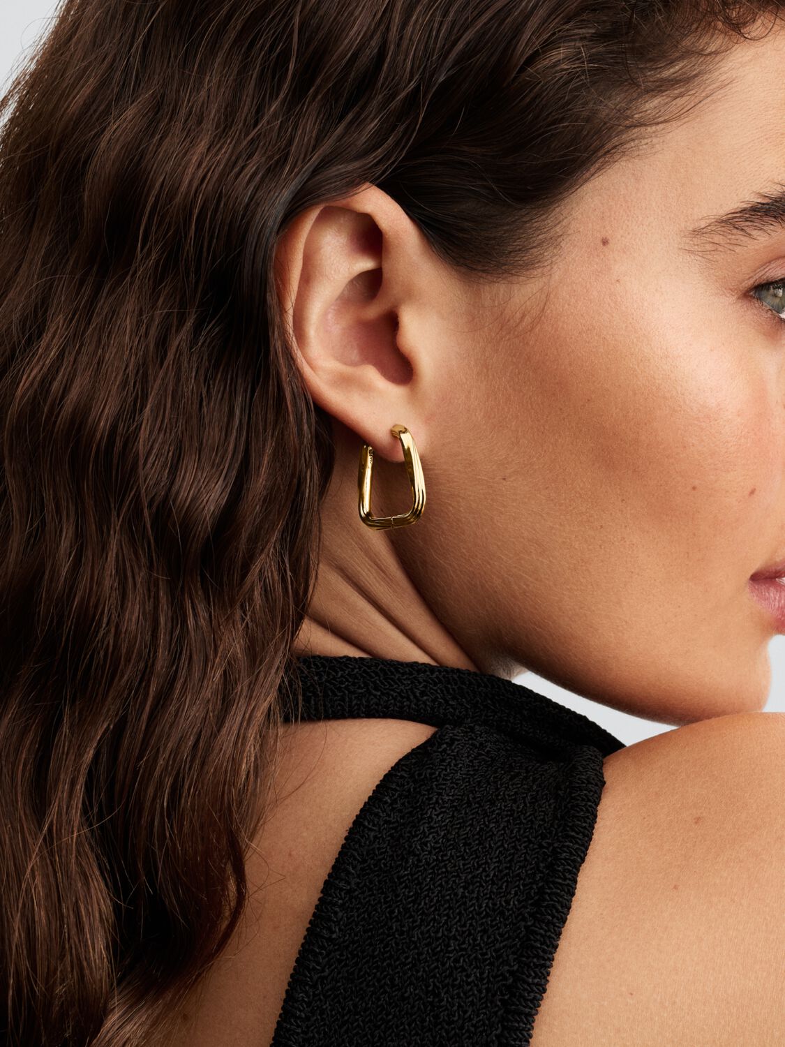 Twisted 14k gold-plated hoop earrings