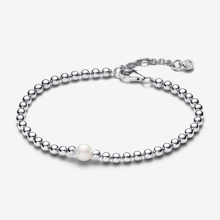 Beaded sterling silver bracelet with white treated freshwater cultured pearl and clear cubic zirconi