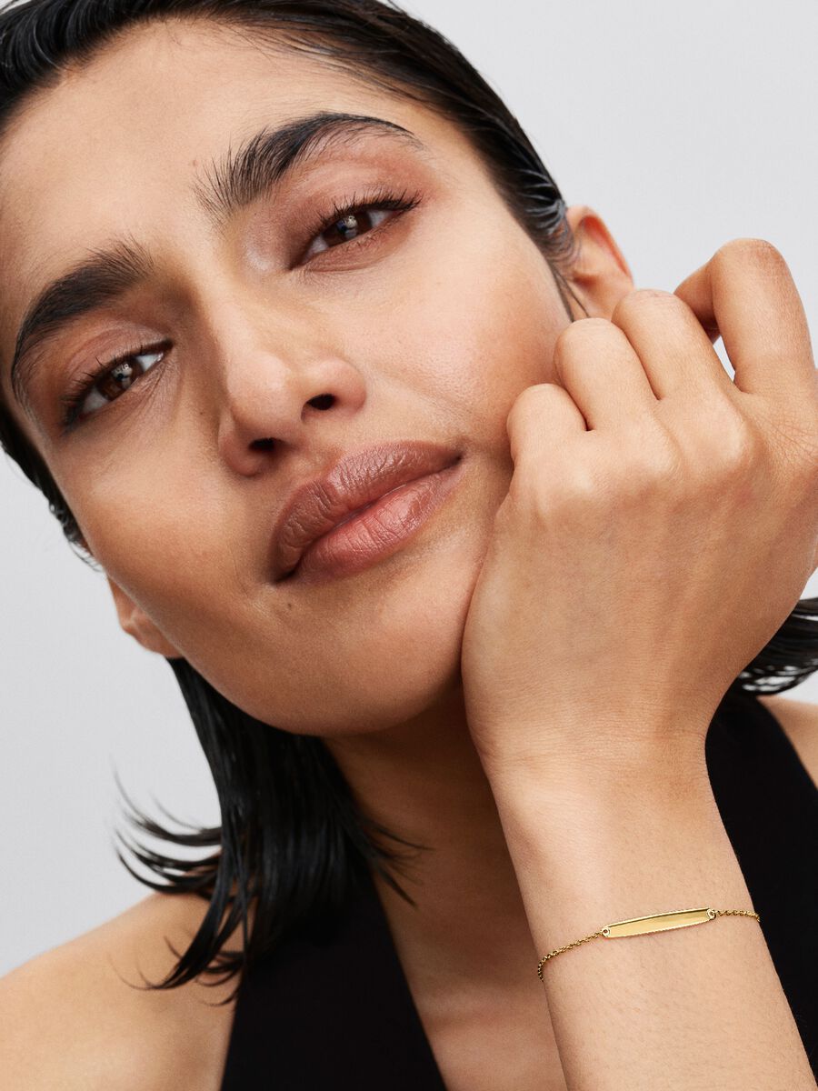 Engravable 14k gold-plated bar bracelet with clear