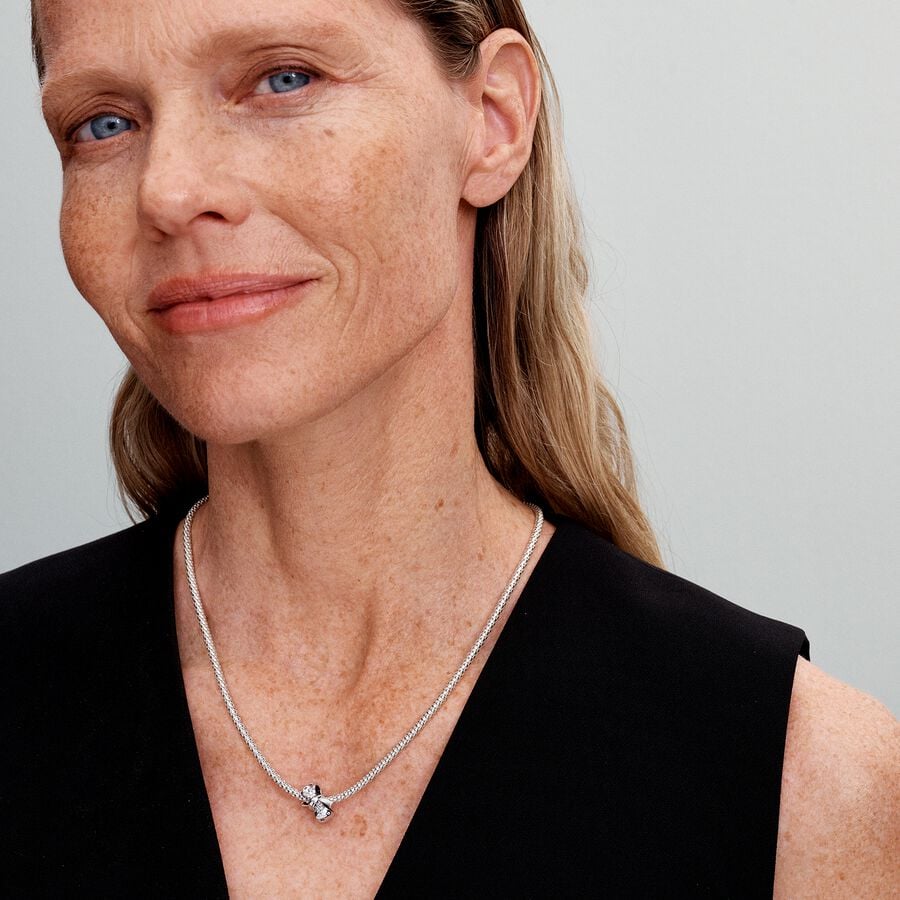 Bow sterling silver charm with clear cubic zirconi