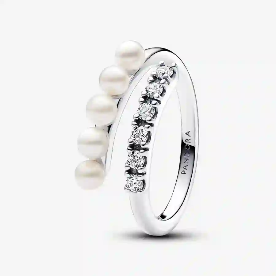 Sterling silver open ring with white treated freshwater cultured pearl and clear cubic zirconia