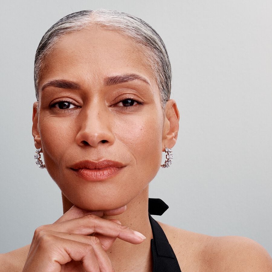 Bow sterling silver hoop earrings with clear cubic