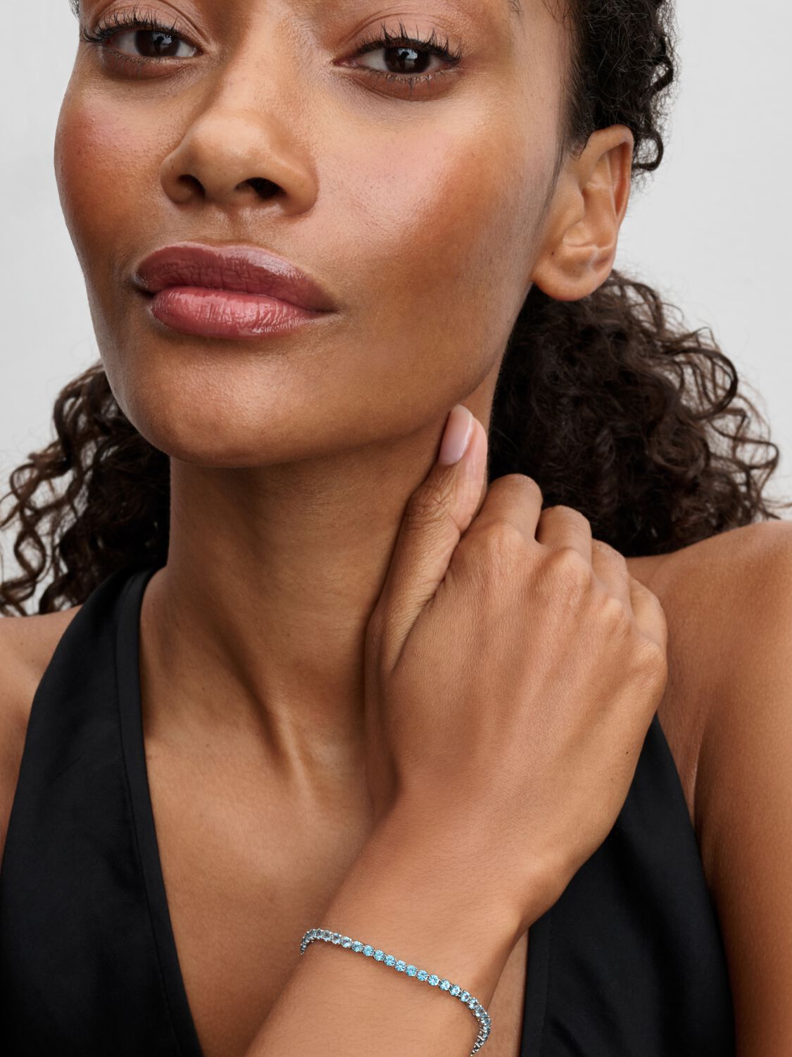 Sterling silver tennis bracelet with aquamarine blue crystal