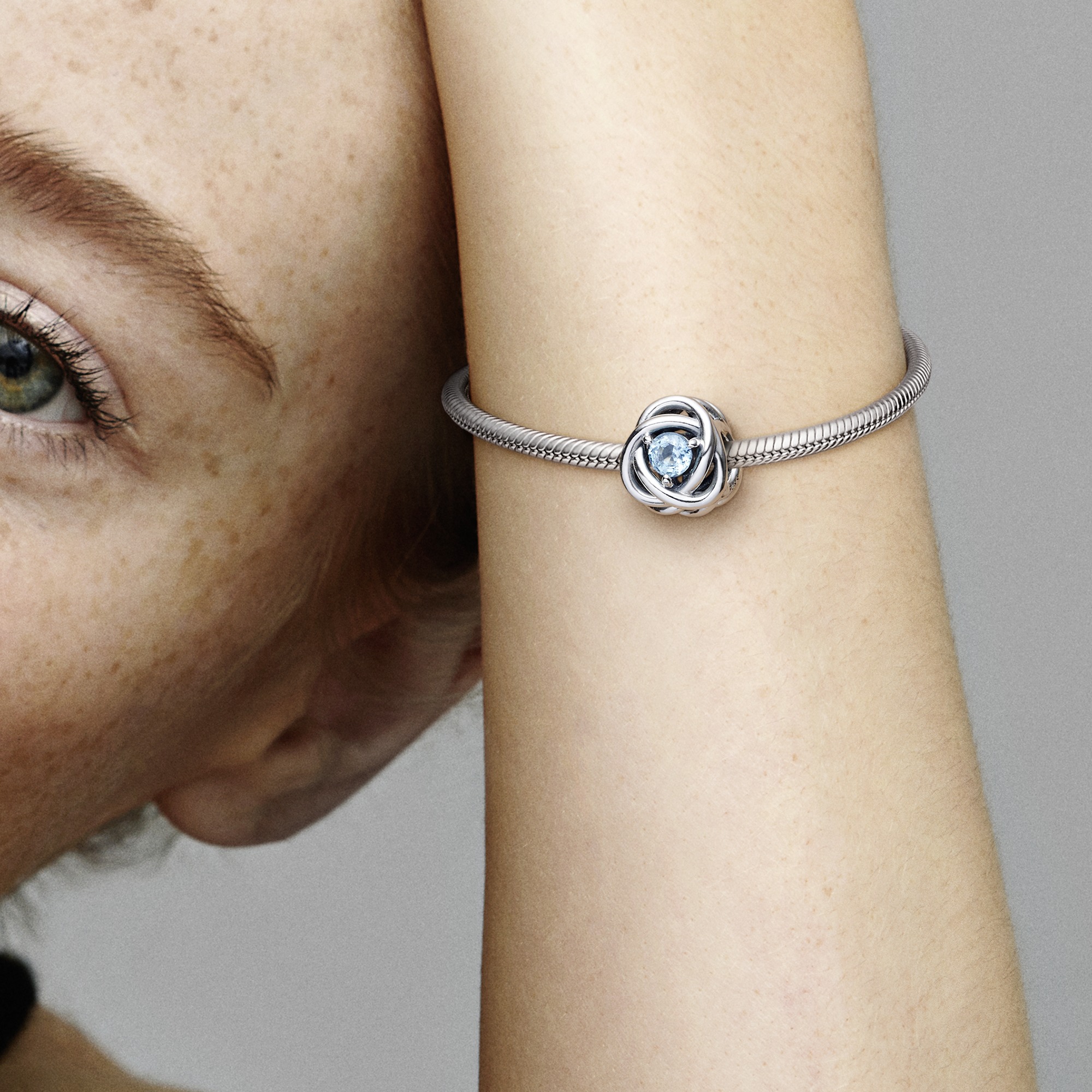 Sterling silver charm with sea aqua blue crystal