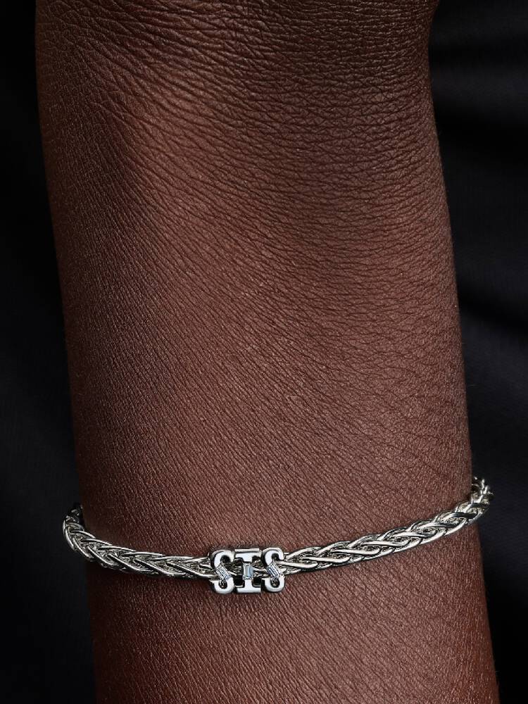 SIS sterling silver charm with clear cubic zirconia