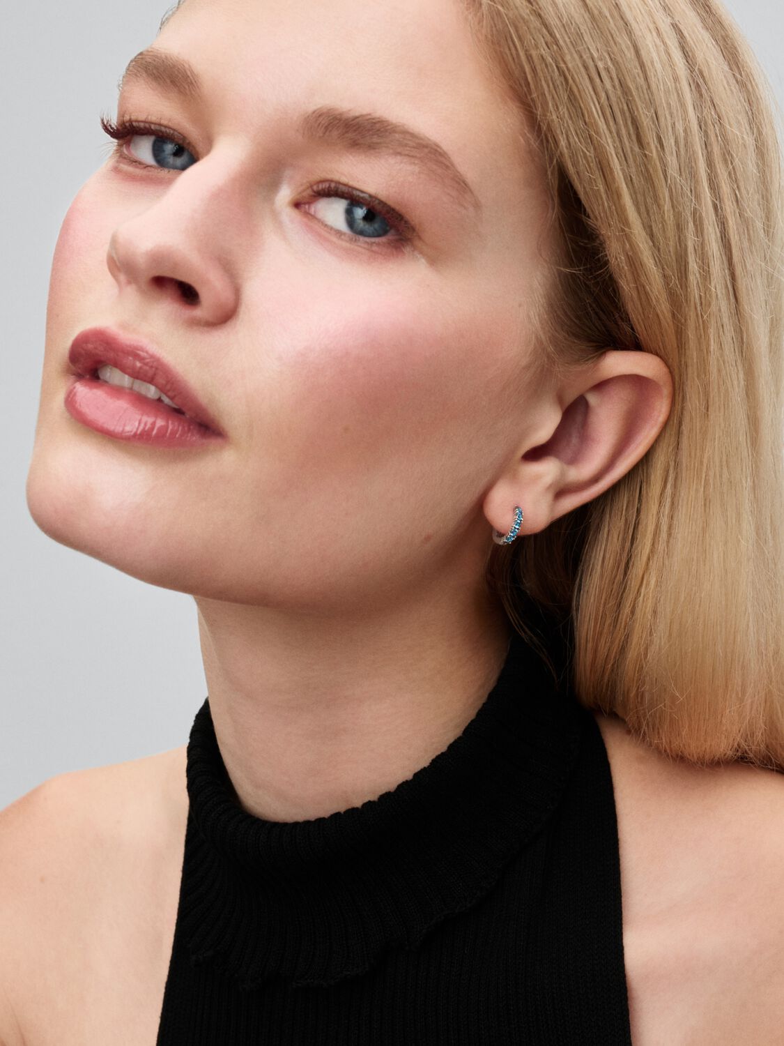 Sterling silver huggie earrings with aquamarine bl