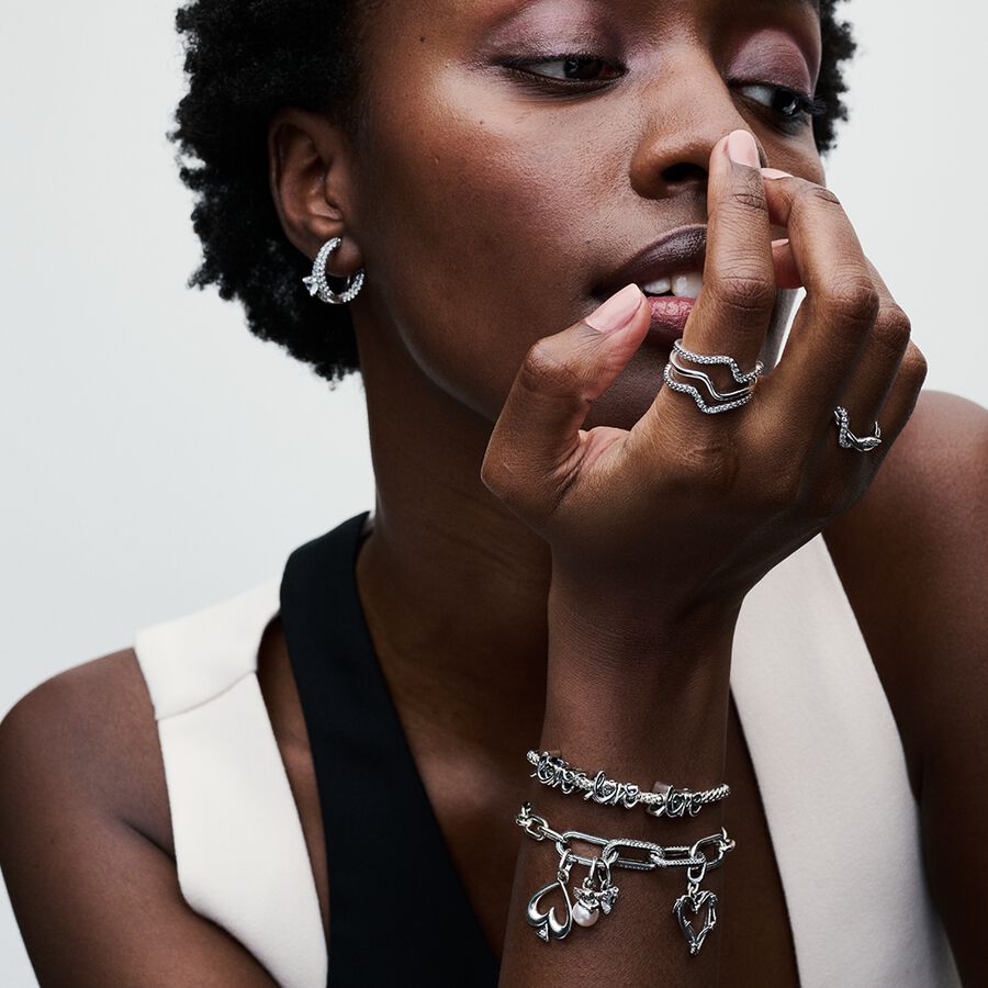 Spade sterling silver medallion with clear cubic z