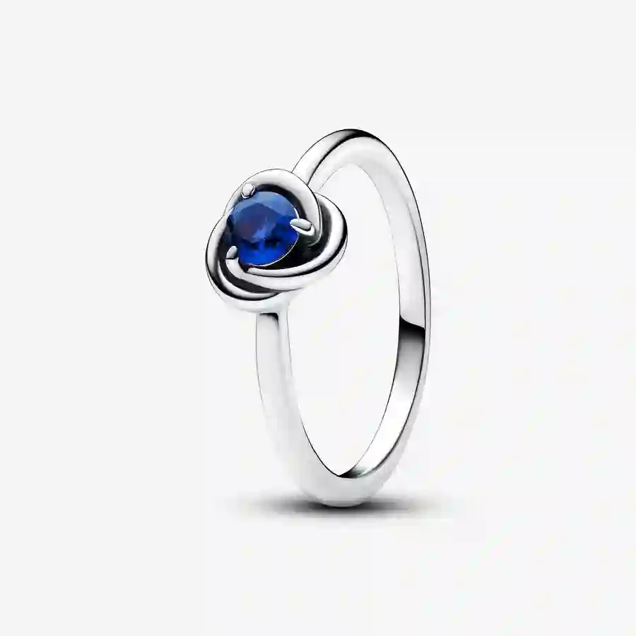 Sterling silver ring with princess blue crystal