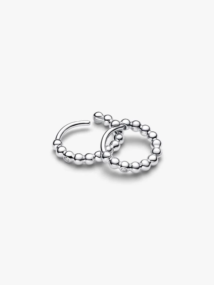 Sterling silver huggie hoop earrings with clear cubic zirconia