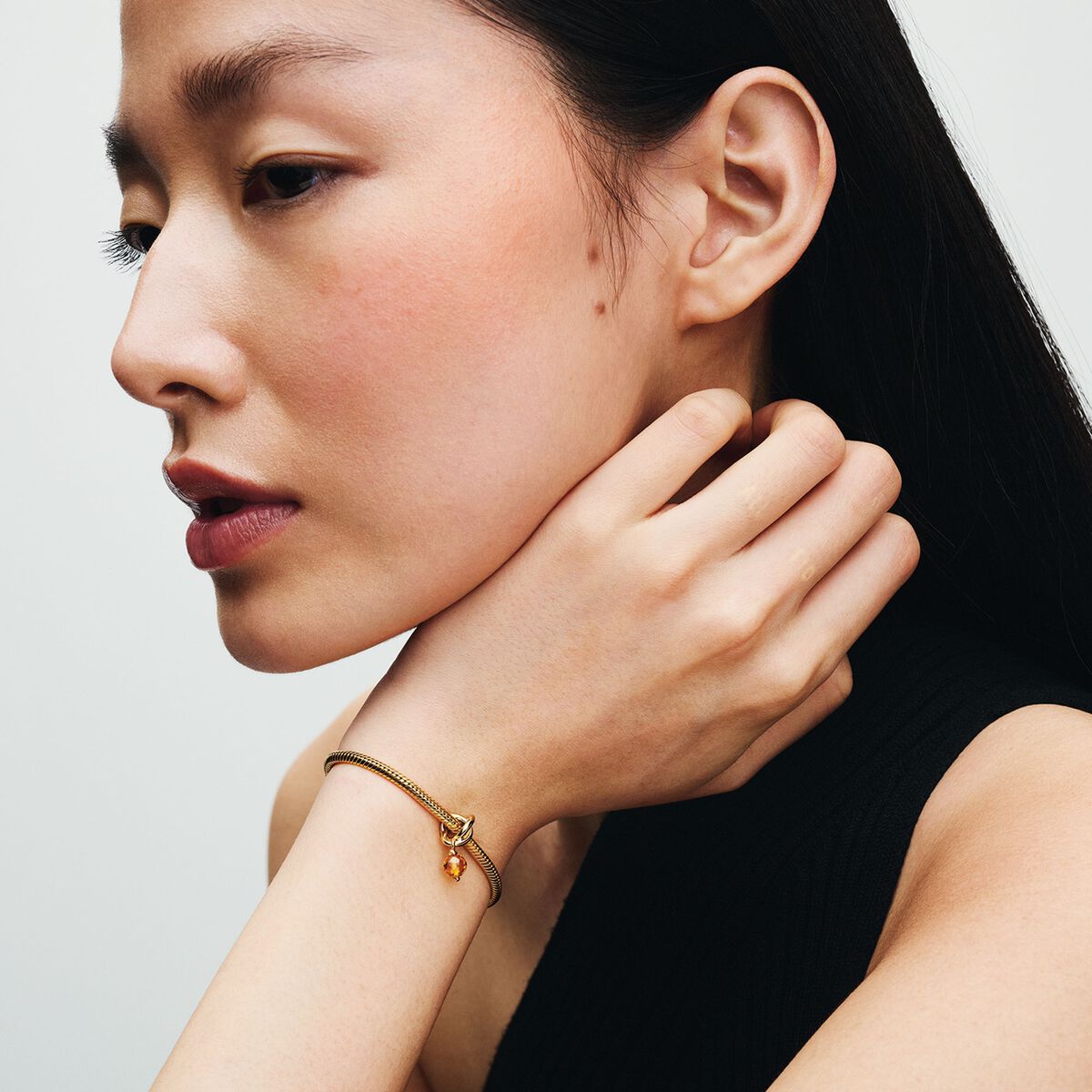 14k Gold-plated dangle with honey coloured crystal