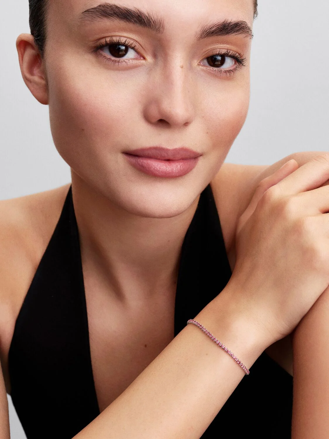 Sterling silver tennis bracelet with fancy pink cu