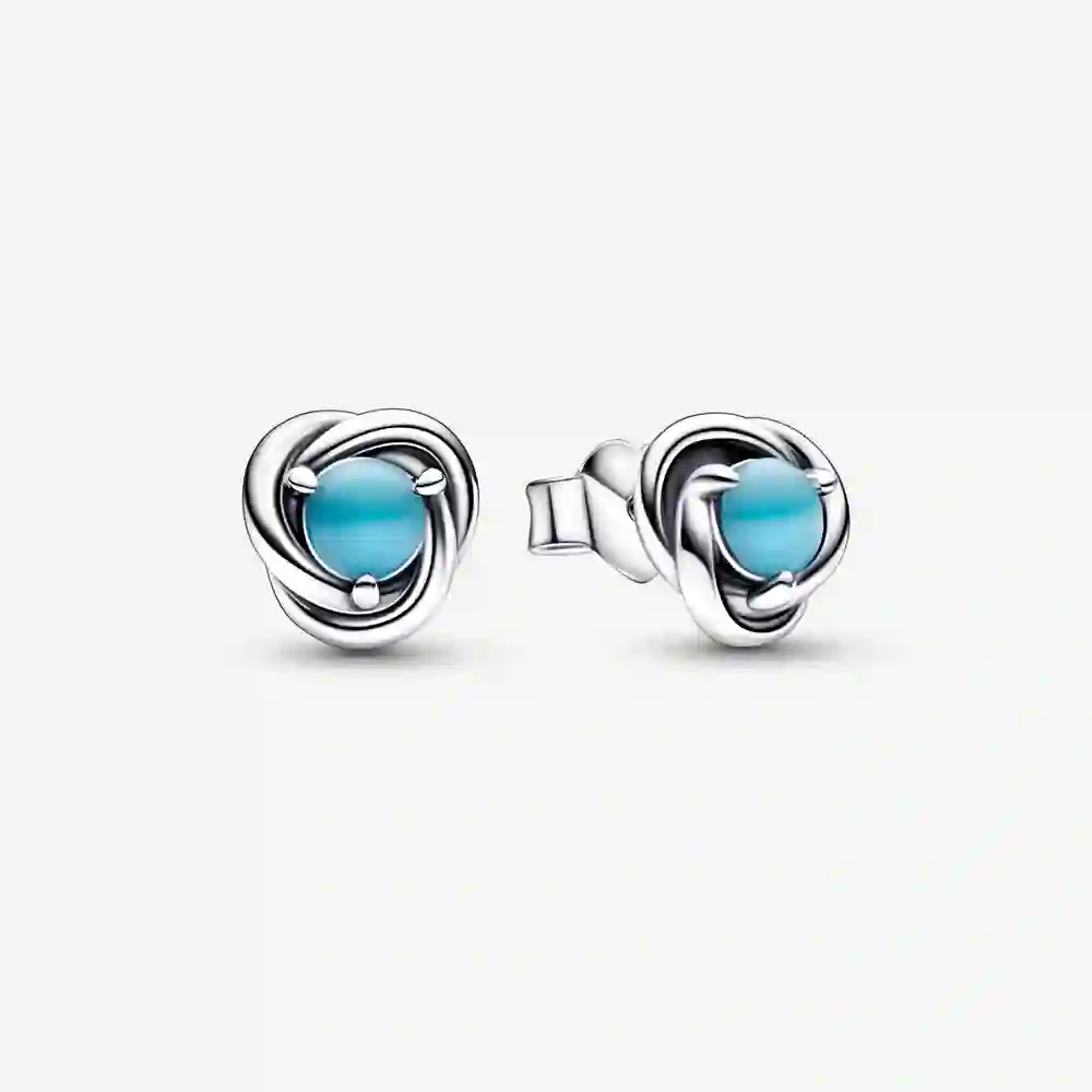Sterling silver stud earrings with capri blue crys