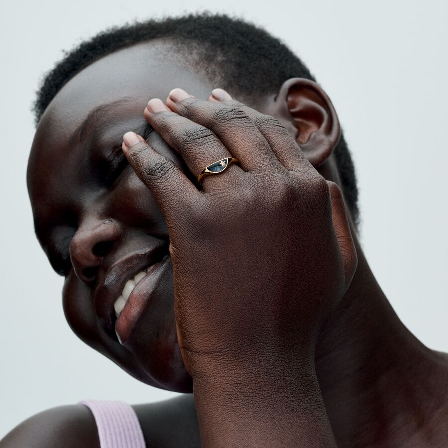 Halved signet 14k gold-plated ring with clear cubic zirconia and glittery black enamel