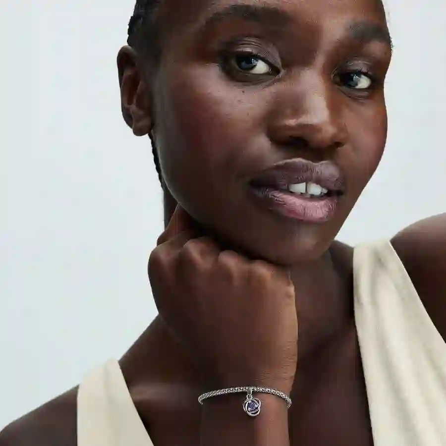 Sterling silver dangle with sweet grape purple crystal and clear cubic zirconia