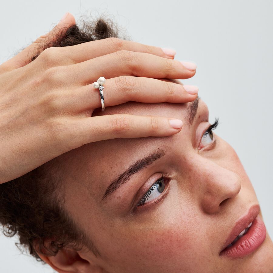 Sterling silver ring with white treated freshwater cultured pearl and clear cubic zirconia