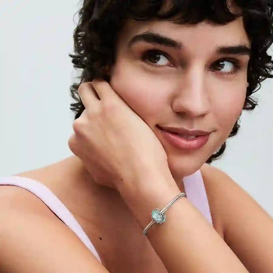 Disney sterling silver charm with light blue Muran