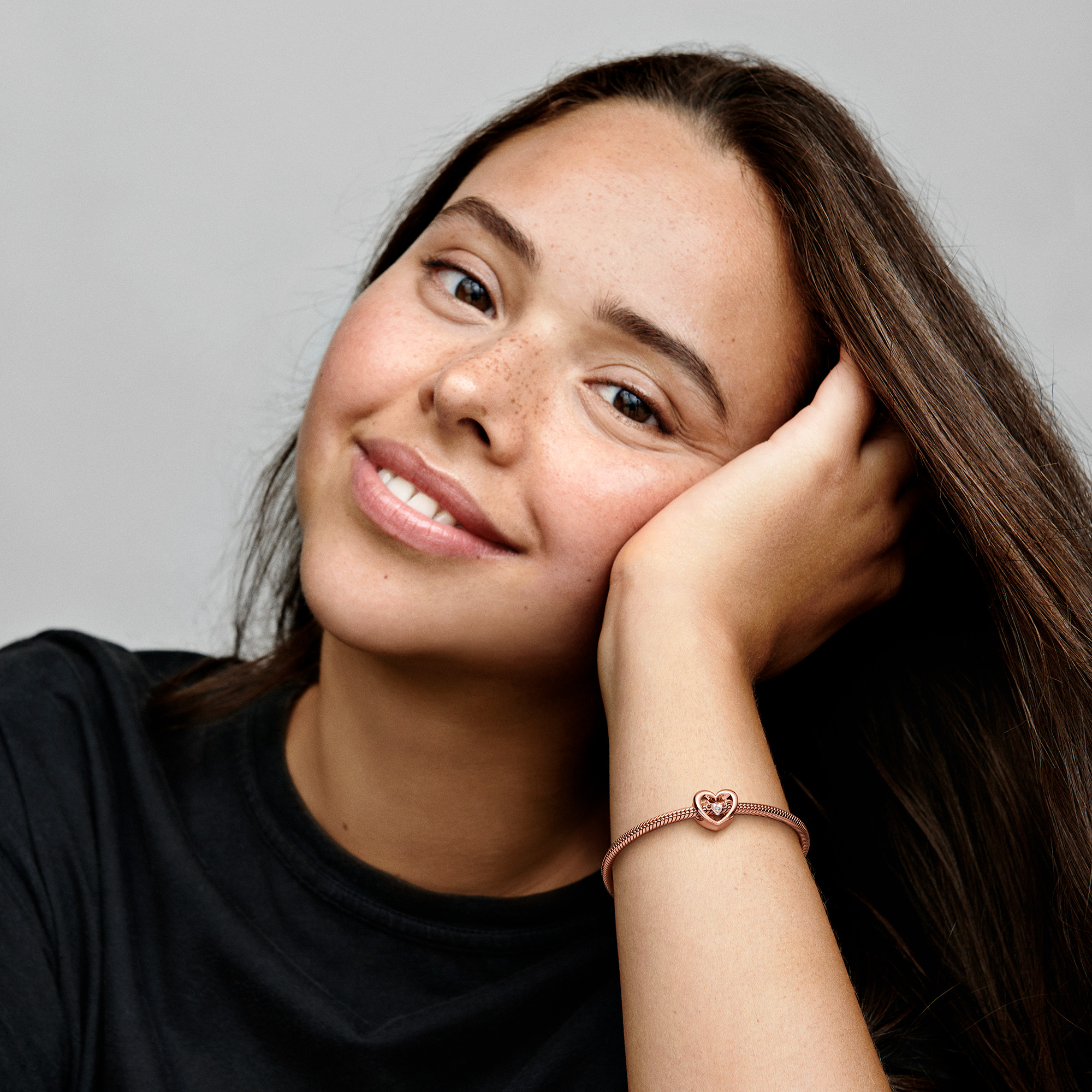 Open heart 14k rose gold-plated charm with clear cubic zirconia