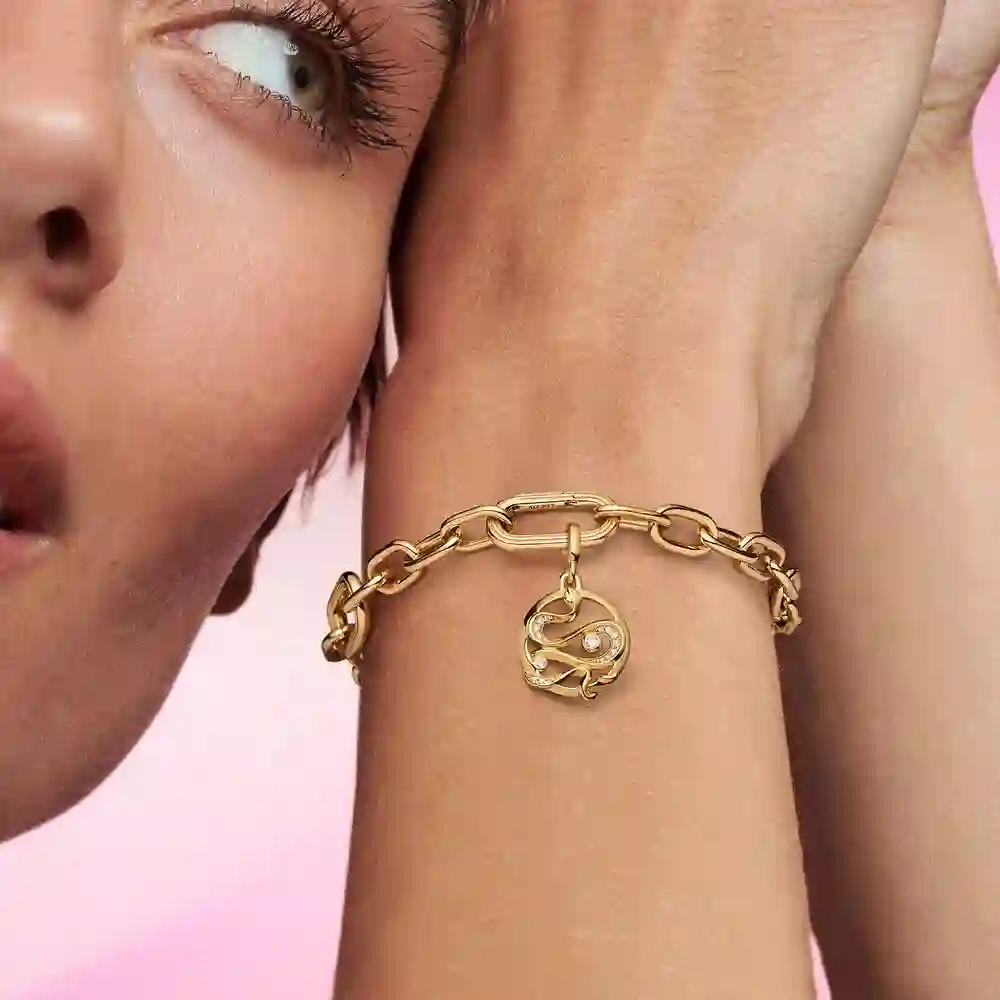 Snake 14k gold-plated medallion with clear cubic zirconia