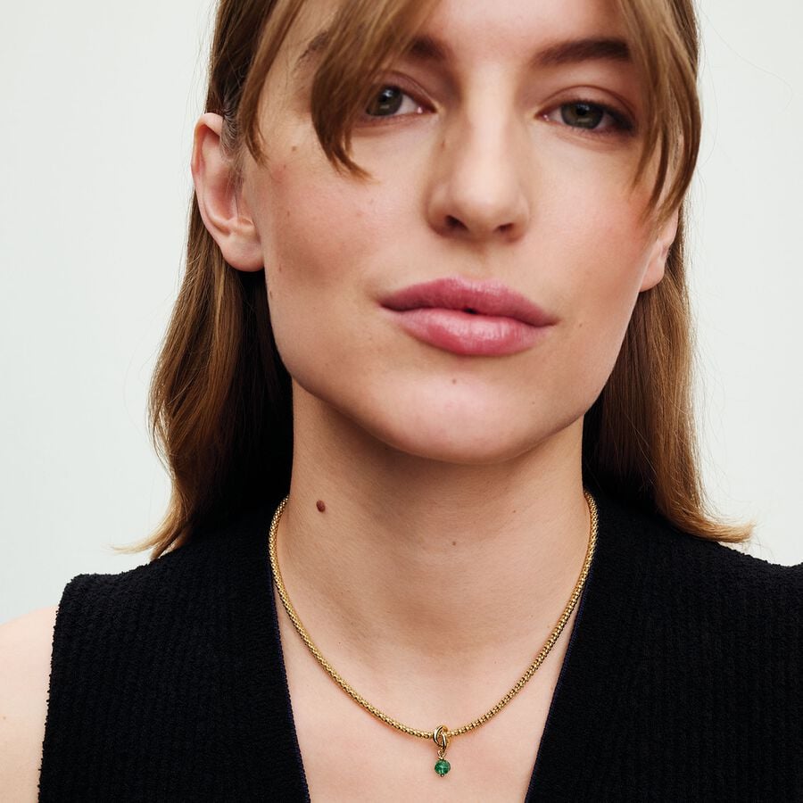 14k Gold-plated dangle with royal green crystal