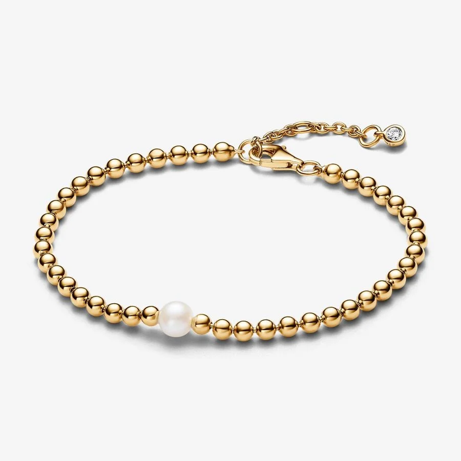 Beaded 14k gold-plated bracelet with white treated freshwater cultured pearl and clear cubic zirconi