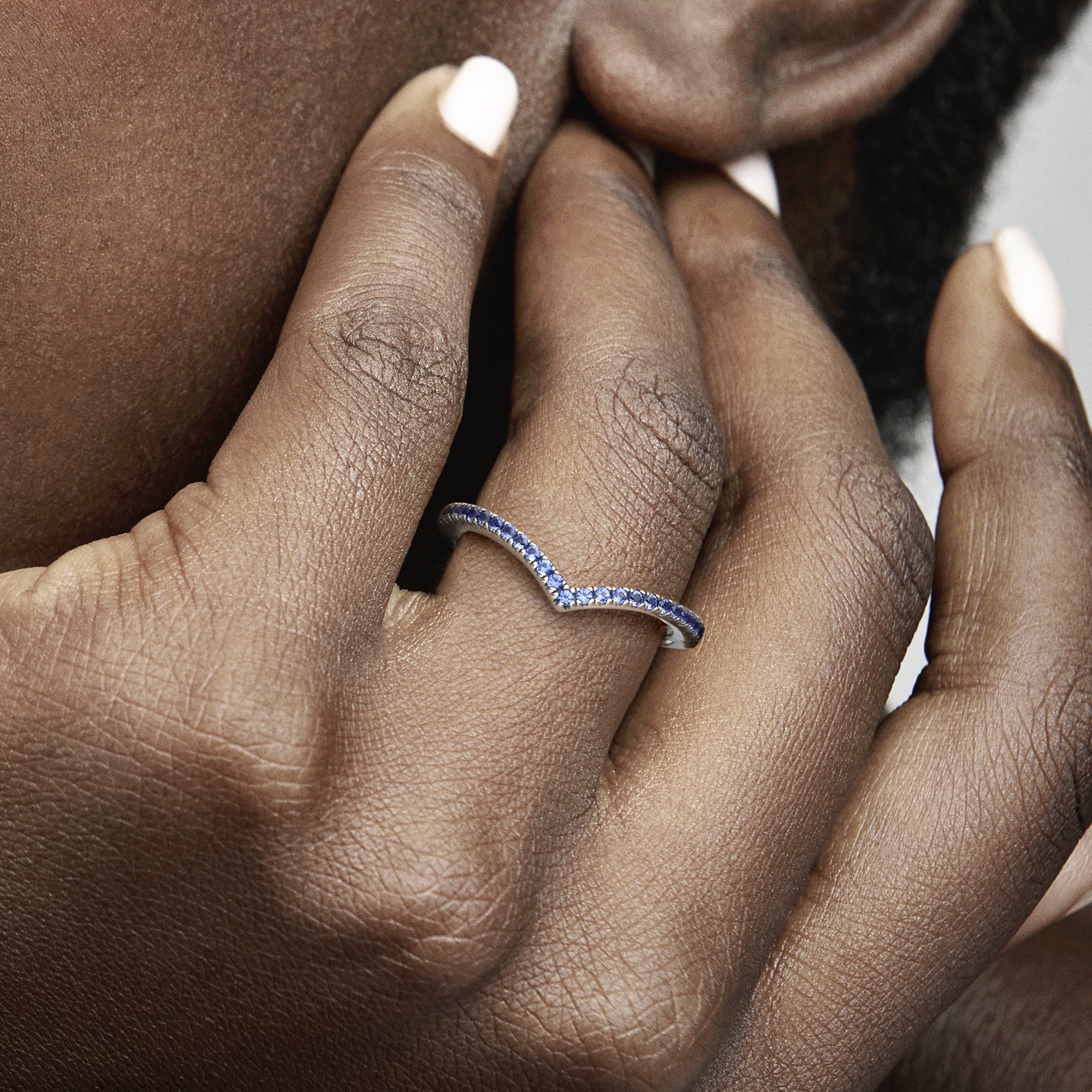 Wishbone sterling silver ring with stellar blue cr