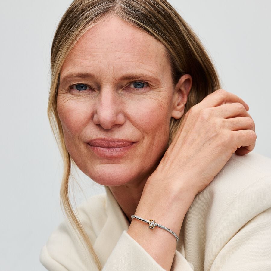 Entwined hearts sterling silver and 14k gold-plated charm