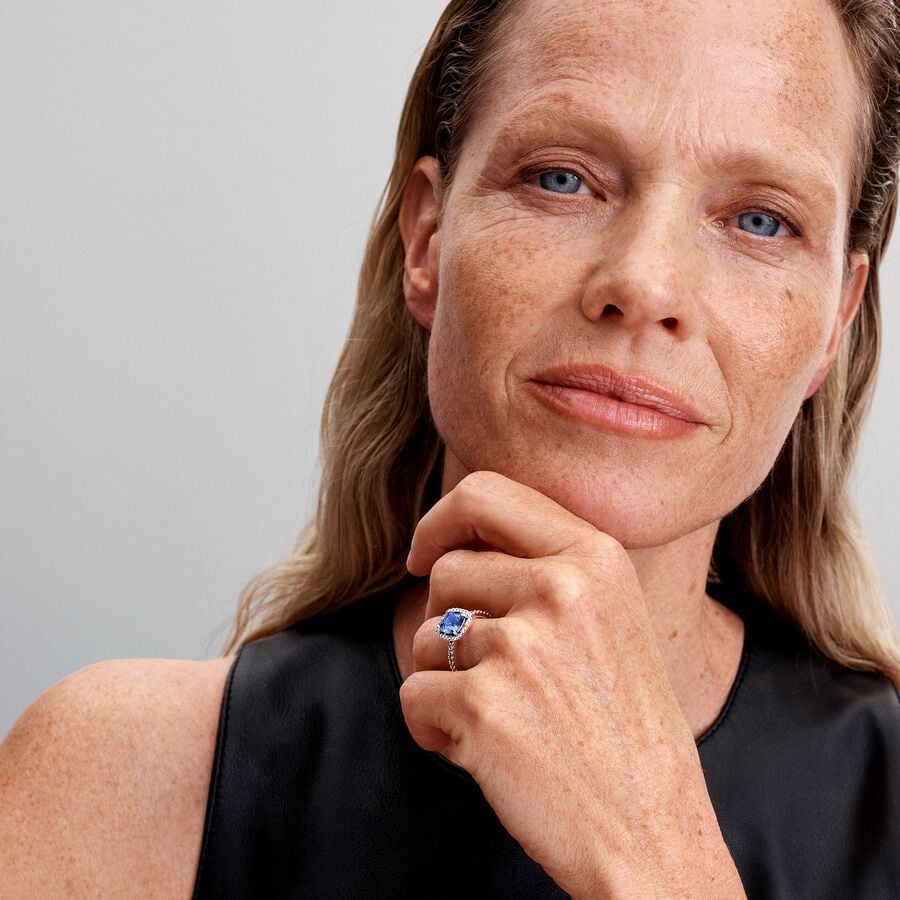 Sterling silver ring with cornflower blue crystal and clear cubic zirconia