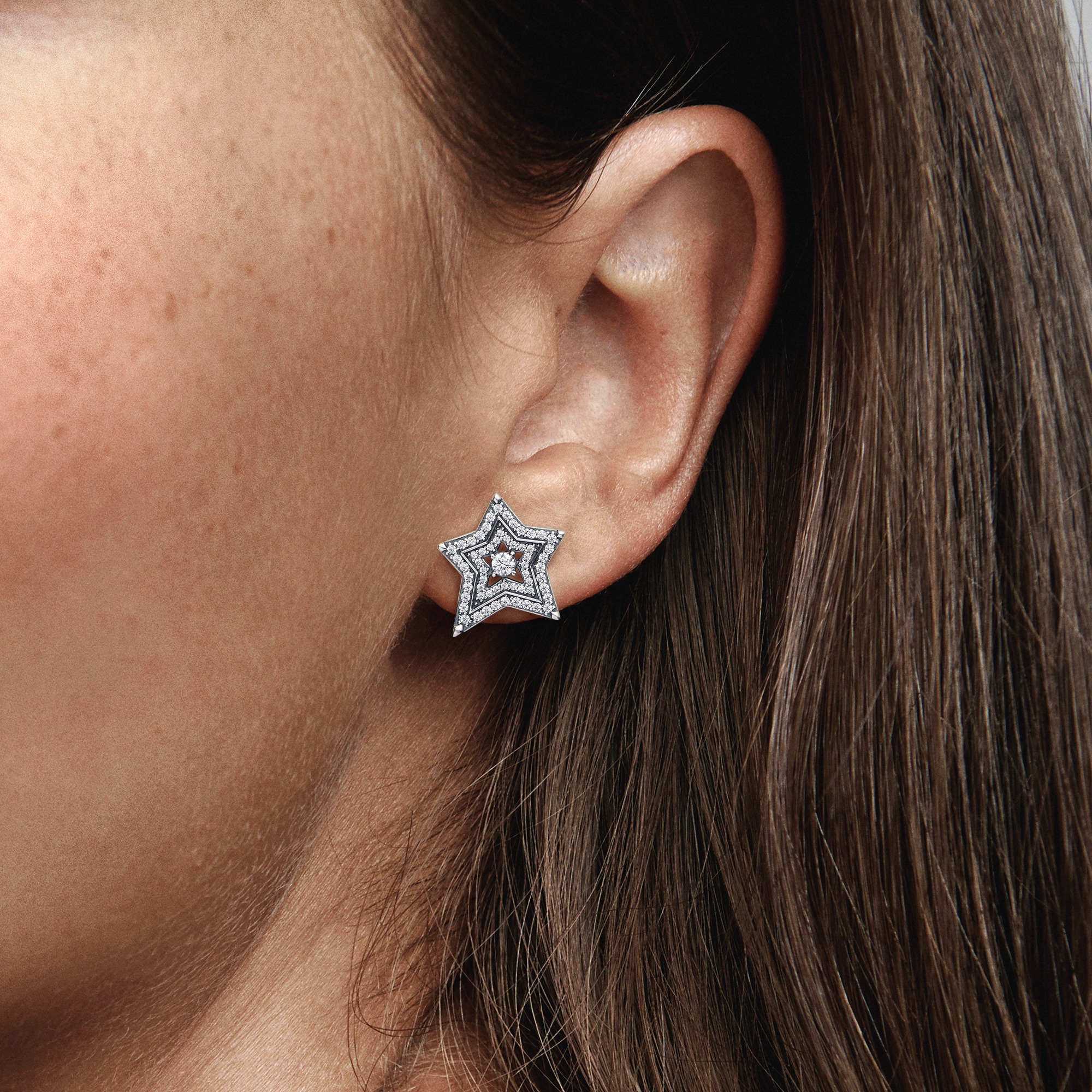 Star sterling silver stud earrings with clear cubi